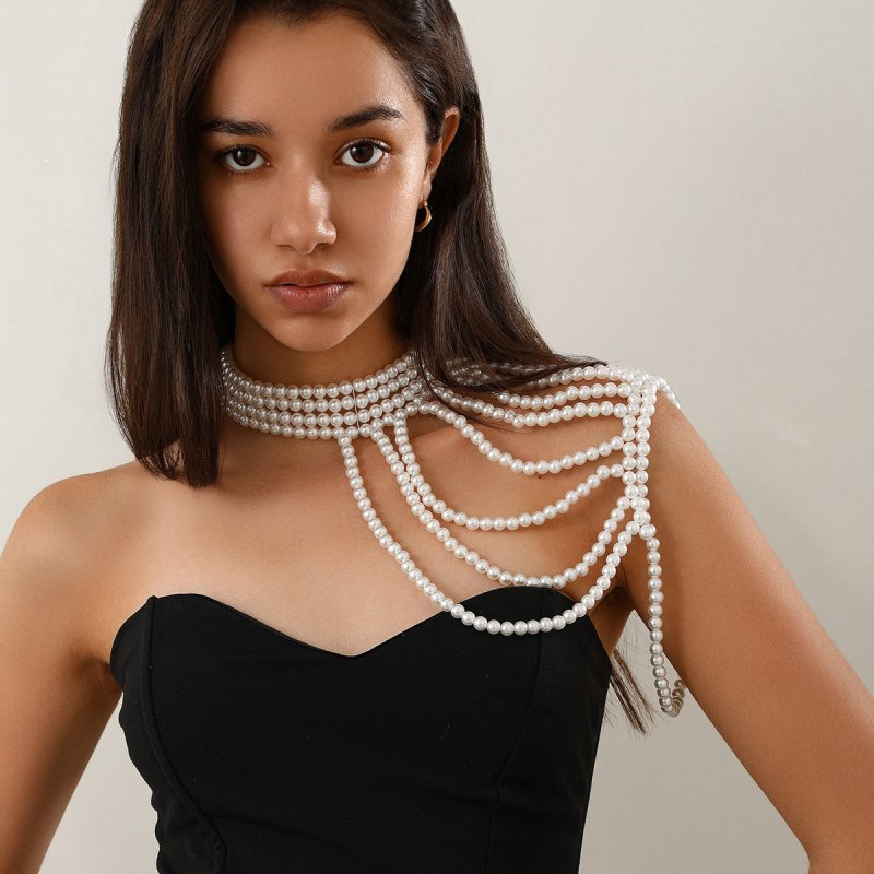Elegant Multi-layer Tassel Imitation Pearl Shoulder Chain Women's $49.00 Dana Fashion Color: 03 White 1606 Women's Accessories Product information: Processing Technology: handmade beads Type: eyebrow ring Color: 01 Gold White 1599,02 White 1603,02 mixed c