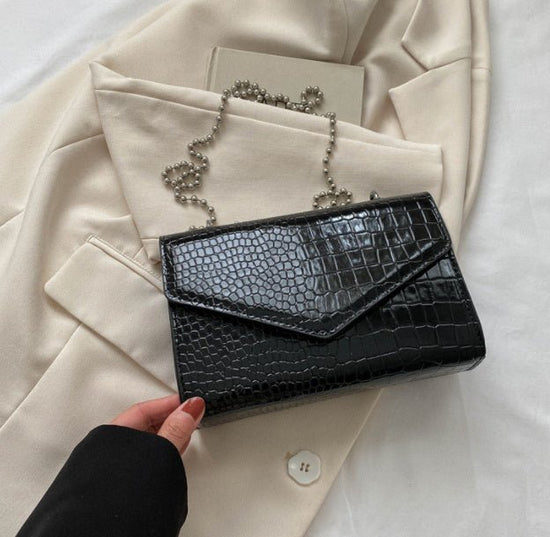Elegant Simple And Fashionable Handbag $26.18 Dana Fashion Color: Black1 Women's Bags Overview: Unique design, stylish and beautiful. Good material, comfortable wear. A variety of colors, any choice. Product Information: Lining texture: no lining Pattern:
