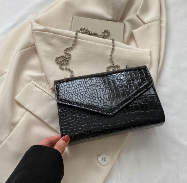 Elegant Simple And Fashionable Handbag $26.18 Dana Fashion Color: Black1 Women's Bags Overview: Unique design, stylish and beautiful. Good material, comfortable wear. A variety of colors, any choice. Product Information: Lining texture: no lining Pattern: