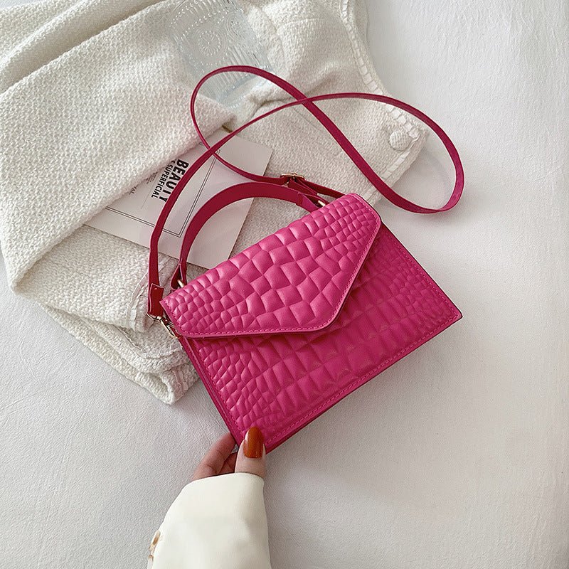 Elegant Simple And Fashionable Handbag $26.18 Dana Fashion Color: Black1 Women's Bags Overview: Unique design, stylish and beautiful. Good material, comfortable wear. A variety of colors, any choice. Product Information: Lining texture: no lining Pattern:
