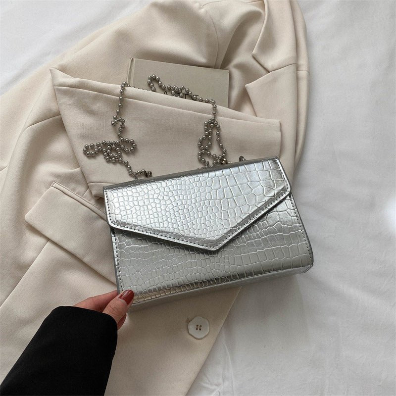 Elegant Simple And Fashionable Handbag $26.18 Dana Fashion Color: Silver Women's Bags Overview: Unique design, stylish and beautiful. Good material, comfortable wear. A variety of colors, any choice. Product Information: Lining texture: no lining Pattern: