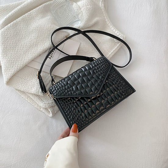 Elegant Simple And Fashionable Handbag $26.18 Dana Fashion Color: Black1 Women's Bags Overview: Unique design, stylish and beautiful. Good material, comfortable wear. A variety of colors, any choice. Product Information: Lining texture: no lining Pattern: