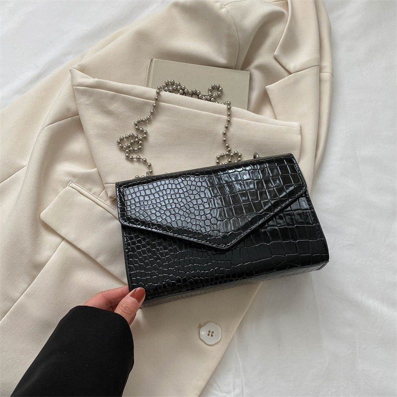 Elegant Simple And Fashionable Handbag $26.18 Dana Fashion Color: Black1 Women's Bags Overview: Unique design, stylish and beautiful. Good material, comfortable wear. A variety of colors, any choice. Product Information: Lining texture: no lining Pattern: