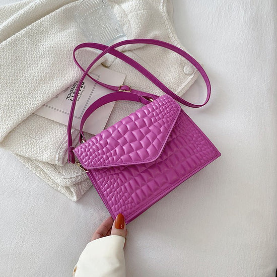 Elegant Simple And Fashionable Handbag $28.70 Dana Fashion Color: Purple Women's Bags Overview: Unique design, stylish and beautiful. Good material, comfortable wear. A variety of colors, any choice. Product Information: Lining texture: no lining Pattern: