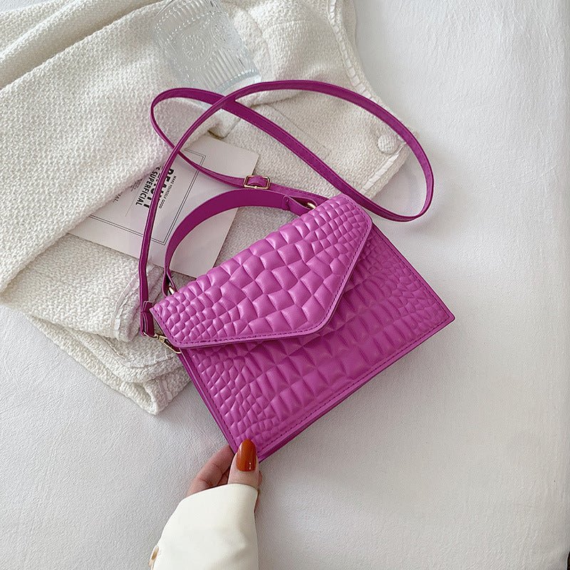 Elegant Simple And Fashionable Handbag $28.70 Dana Fashion Color: Purple Women's Bags Overview: Unique design, stylish and beautiful. Good material, comfortable wear. A variety of colors, any choice. Product Information: Lining texture: no lining Pattern: