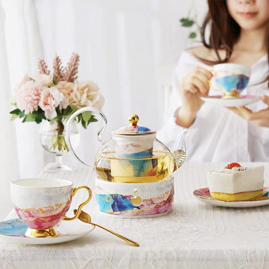 English Ceramic Glass Flower Tea Cup Set $479.21 Dana Fashion style: A Dana's Kitchen Product information: Product name: Qianhe Hongyan glass flower tea set Material: bone china, glass Craft: Gilt/Paper Craft Capacity: pot 600ML/cup 200ML Color: Qianhe gl
