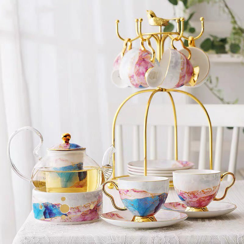 English Ceramic Glass Flower Tea Cup Set $479.21 Dana Fashion style: A Dana's Kitchen Product information: Product name: Qianhe Hongyan glass flower tea set Material: bone china, glass Craft: Gilt/Paper Craft Capacity: pot 600ML/cup 200ML Color: Qianhe gl