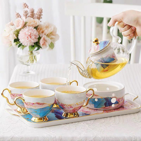 English Ceramic Glass Flower Tea Cup Set $479.21 Dana Fashion style: A Dana's Kitchen Product information: Product name: Qianhe Hongyan glass flower tea set Material: bone china, glass Craft: Gilt/Paper Craft Capacity: pot 600ML/cup 200ML Color: Qianhe gl