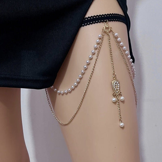 European And American Beach Elastic Multi-layer Pearl Thigh Chain Women $15.00 Dana Fashion Color: Gold Women's Accessories Product information: Type: Anklet Color: Gold Style: Women's Material: Alloy Style: ethnic style Packing list: Leg chain * 1 Produc
