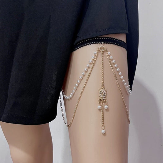 European And American Beach Elastic Multi-layer Pearl Thigh Chain Women $15.00 Dana Fashion Color: Gold Women's Accessories Product information: Type: Anklet Color: Gold Style: Women's Material: Alloy Style: ethnic style Packing list: Leg chain * 1 Produc