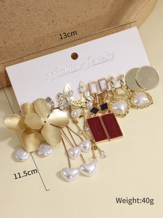 European And American Creative French Pearl Butterfly Flower Earrings Water Drop Pearl Butterfly Chain Earrings 6-piece Set $33.96 Dana Fashion Color: Colorful Women's Accessories Product information: Material: Alloy Style: European and American Style: Wo