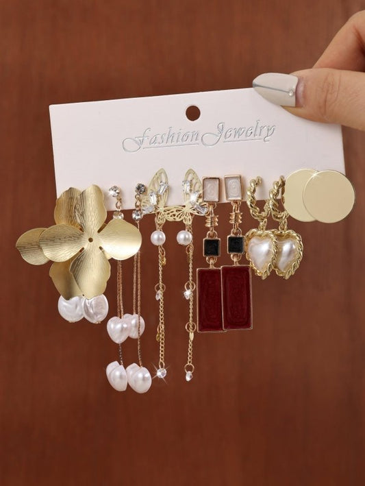 European And American Creative French Pearl Butterfly Flower Earrings Water Drop Pearl Butterfly Chain Earrings 6-piece Set $33.96 Dana Fashion Color: Colorful Women's Accessories Product information: Material: Alloy Style: European and American Style: Wo
