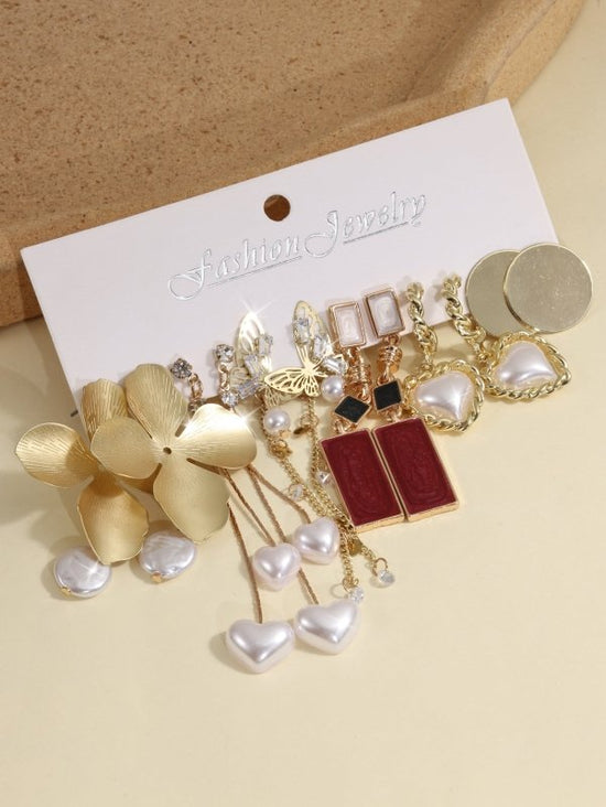 European And American Creative French Pearl Butterfly Flower Earrings Water Drop Pearl Butterfly Chain Earrings 6-piece Set $33.96 Dana Fashion Color: Colorful Women's Accessories Product information: Material: Alloy Style: European and American Style: Wo