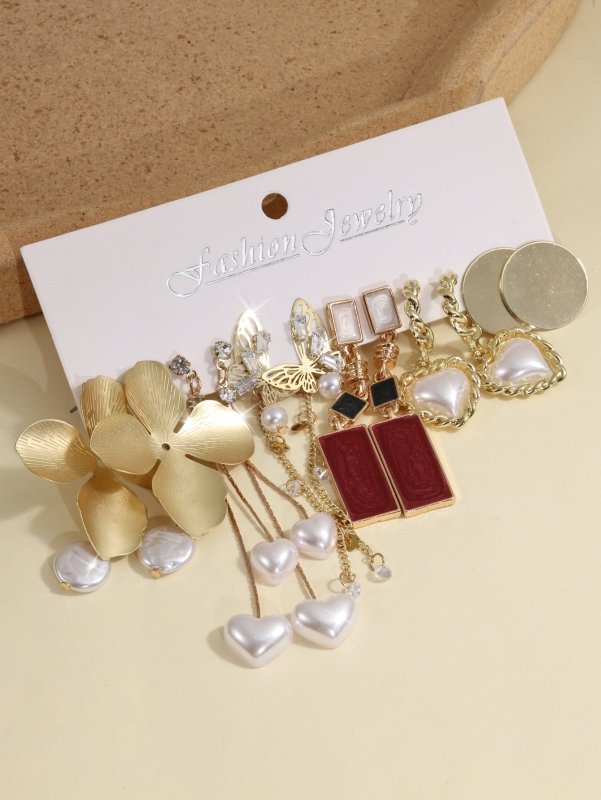 European And American Creative French Pearl Butterfly Flower Earrings Water Drop Pearl Butterfly Chain Earrings 6-piece Set $33.96 Dana Fashion Color: Colorful Women's Accessories Product information: Material: Alloy Style: European and American Style: Wo
