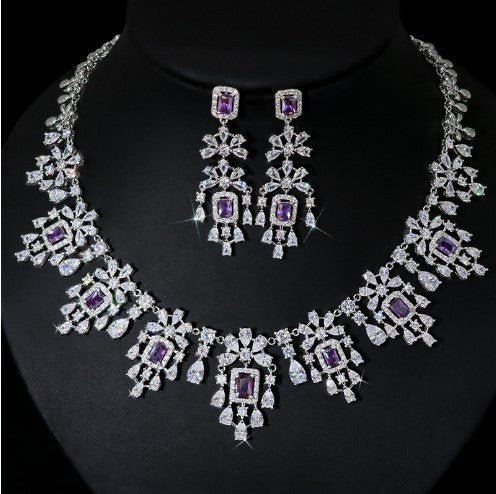 European And American Fashion Retro Square Zircon Necklace Earrings $317.42 Dana Fashion Color: Purple Zirconium Women's Accessories Product information: Pendant material: mixed gem inlaid Chain style: O-ring chain Material: zircon Popular elements: round