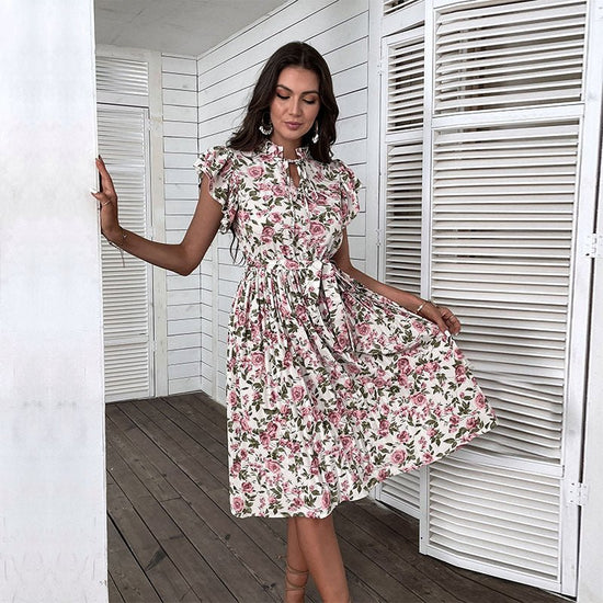 European And American Pleated Skirt Floral Ruffle Sleeve Lace-up Dress $47.35 Dana Fashion Color: White Size: L Women's clothing Product information: Pattern: Printing Skirt type: A- line skirt Color: White Waist type: high waist Size: S,M,L,XL,XXL Style