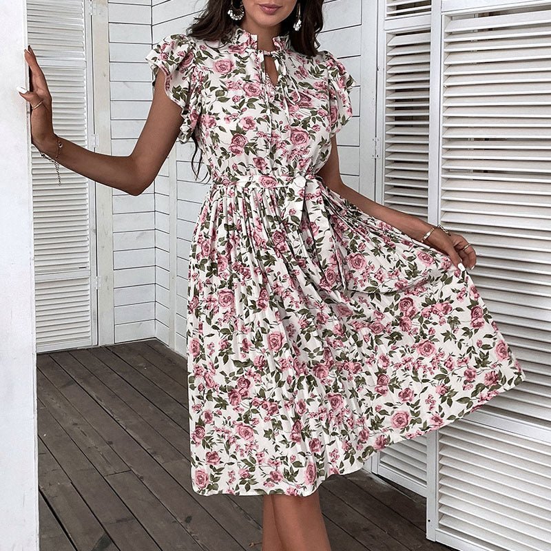 European And American Pleated Skirt Floral Ruffle Sleeve Lace-up Dress $47.35 Dana Fashion Color: White Size: L Women's clothing Product information: Pattern: Printing Skirt type: A- line skirt Color: White Waist type: high waist Size: S,M,L,XL,XXL Style