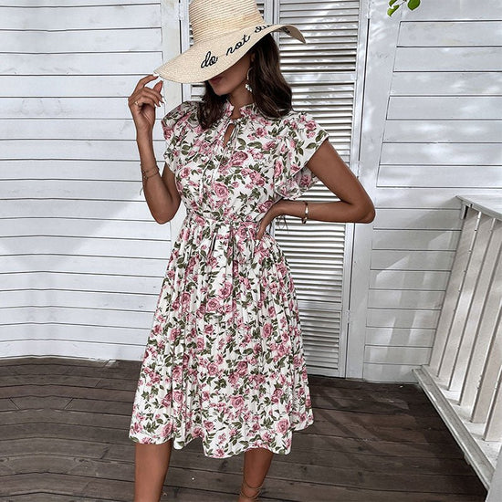 European And American Pleated Skirt Floral Ruffle Sleeve Lace-up Dress $47.35 Dana Fashion Color: White Size: L Women's clothing Product information: Pattern: Printing Skirt type: A- line skirt Color: White Waist type: high waist Size: S,M,L,XL,XXL Style