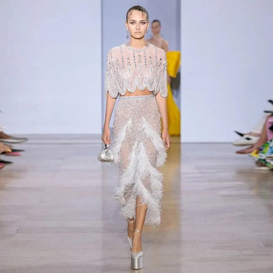 European And American Silver Nude Slim-fit Feather Shawl Host Performance Ladies' Evening Dress $799.00 Dana Fashion Color: Silver Nude Size: L Women's clothing Product information: Fabric name: Organza Applicable scenarios: Wedding, hosting, party, eveni