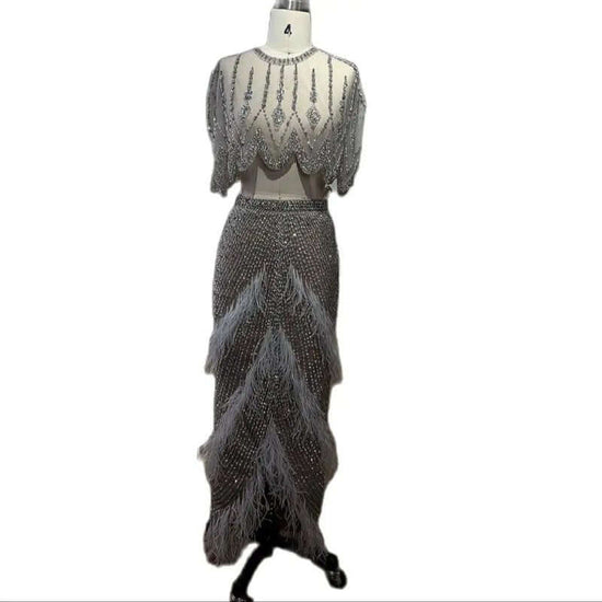 European And American Silver Nude Slim-fit Feather Shawl Host Performance Ladies' Evening Dress $799.00 Dana Fashion Color: Silver Nude Size: L Women's clothing Product information: Fabric name: Organza Applicable scenarios: Wedding, hosting, party, eveni