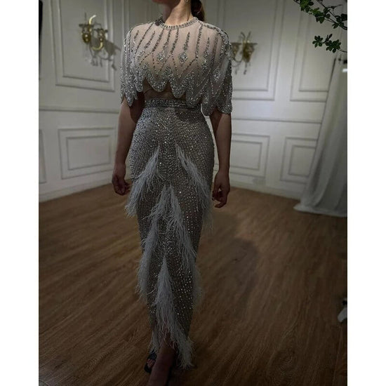European And American Silver Nude Slim-fit Feather Shawl Host Performance Ladies' Evening Dress $799.00 Dana Fashion Color: Silver Nude Size: L Women's clothing Product information: Fabric name: Organza Applicable scenarios: Wedding, hosting, party, eveni