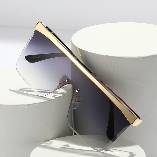 European And American Square Pair Sunglasses One-piece Lens $23.13 Dana Fashion Color: Gold frame blue tea style: New Women's Accessories Product information: Name: Sunglasses Lens material:PC Frame material: metal Eyewear style: Box Style: fashion, perso