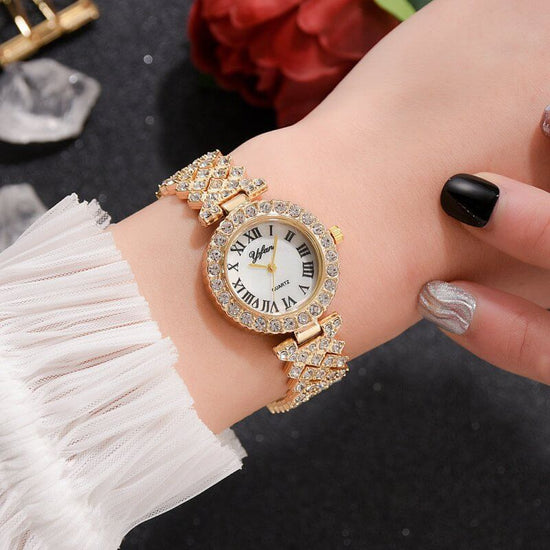 Exquisite Dial And Strap Full Of Diamonds Ancient Roman Scale Women's Watch $26.19 Dana Fashion Color: Gold style: With bracelet Women's Accessories Product information: Movement: quartz Surface material: glass Shell Material: Alloy Strap Material: Alloy