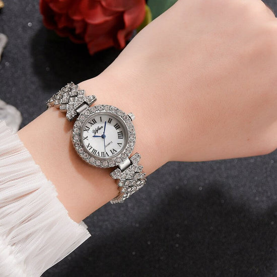 Exquisite Dial And Strap Full Of Diamonds Ancient Roman Scale Women's Watch $26.19 Dana Fashion Color: Gold style: With bracelet Women's Accessories Product information: Movement: quartz Surface material: glass Shell Material: Alloy Strap Material: Alloy