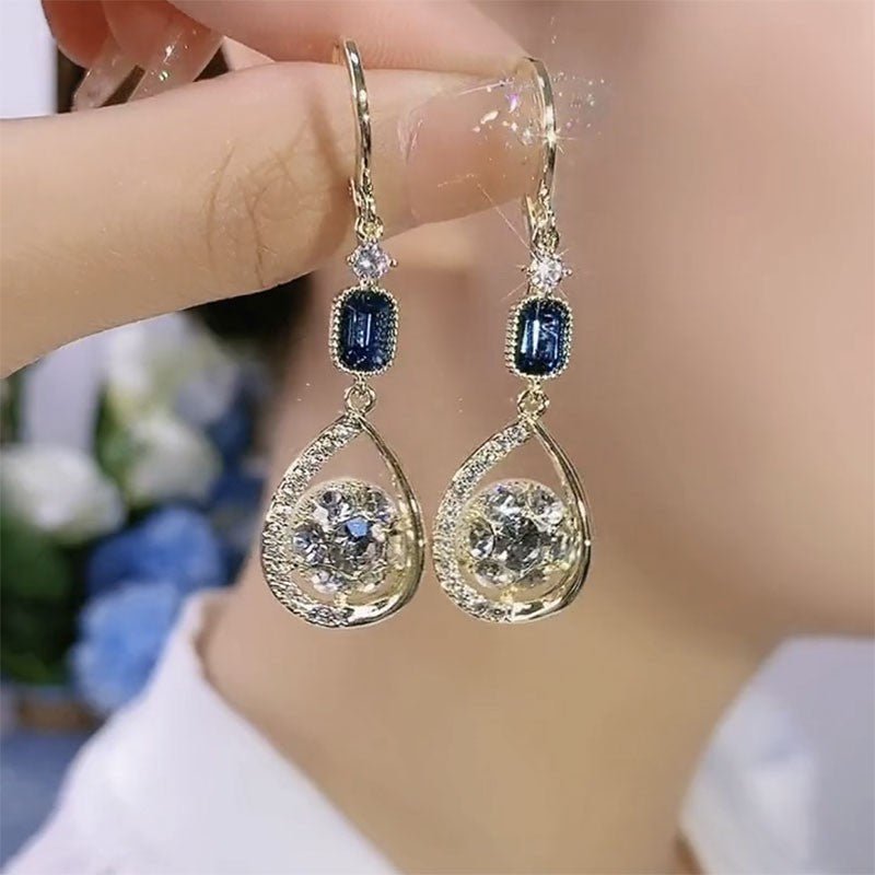 Exquisite Light Luxury High-grade Diamond-embedded Water Drop Earrings $21.99 Dana Fashion Color: Golden Ear Clip Women's Accessories Product information: Treatment Process: Diamond Color: gold ear clip Applicable people: women Style: Women's Material: Al