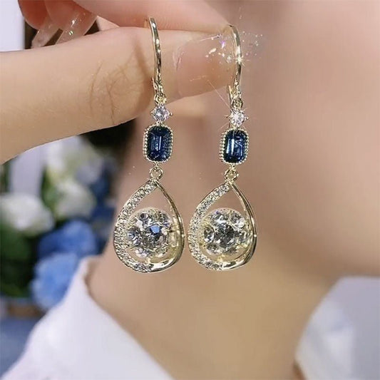 Exquisite Light Luxury High-grade Diamond-embedded Water Drop Earrings $21.99 Dana Fashion Color: Golden Ear Clip Women's Accessories Product information: Treatment Process: Diamond Color: gold ear clip Applicable people: women Style: Women's Material: Al