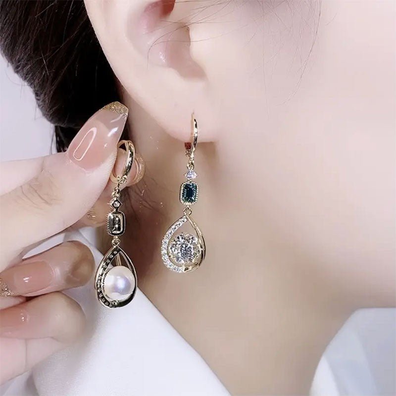 Exquisite Light Luxury High-grade Diamond-embedded Water Drop Earrings $21.99 Dana Fashion Color: Golden Ear Clip Women's Accessories Product information: Treatment Process: Diamond Color: gold ear clip Applicable people: women Style: Women's Material: Al