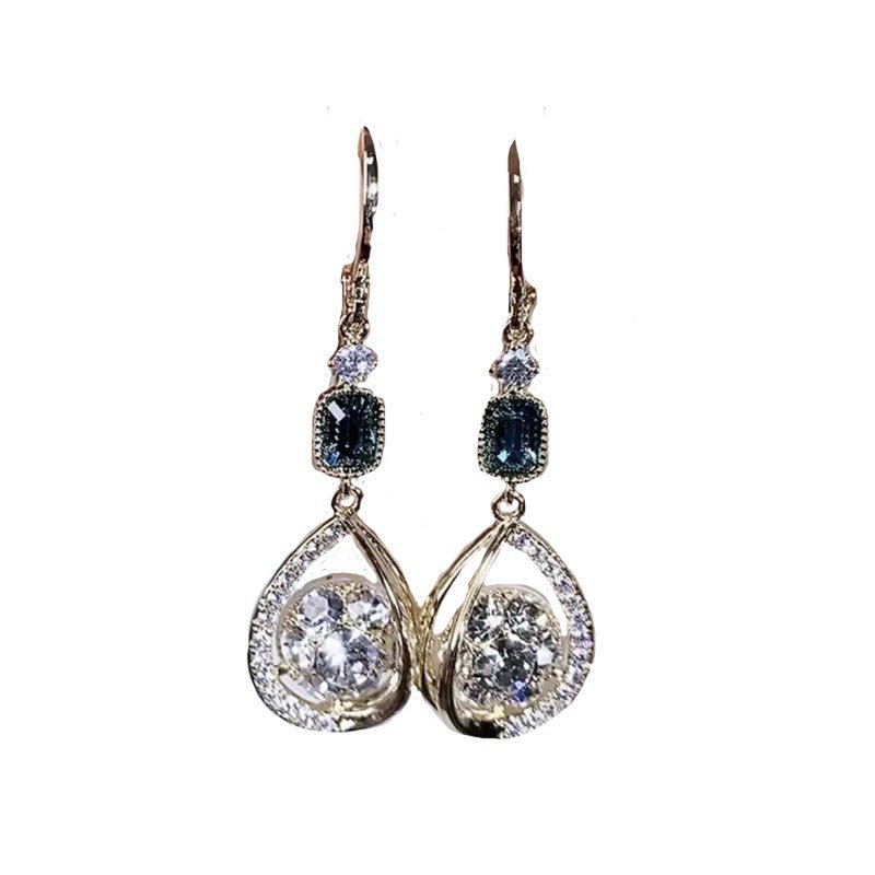 Exquisite Light Luxury High-grade Diamond-embedded Water Drop Earrings $21.99 Dana Fashion Color: Golden Ear Clip Women's Accessories Product information: Treatment Process: Diamond Color: gold ear clip Applicable people: women Style: Women's Material: Al