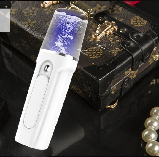 Facial Moisturizing Facial Beauty Apparatus With USB Charging Battery Bank $17.55 Dana Fashion Color: White Model: Luxury Beauty Tools Features: Nano Mist for Better Absorption: Nano water molecules is tiny enough and can penetrate into the bottom of skin