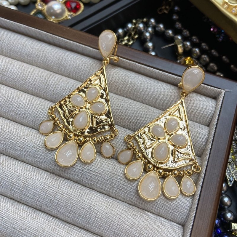 Fan-shaped White Jade Tassel Earrings Water Drop Long Ear Studs $29.50 Dana Fashion Color: White Jade Women's Accessories Product information: Color: fan-shaped white jade tassel earrings Applicable people: women Material: Copper Modeling: Constellation,