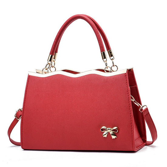 Fashion Bowknot Handbag Large Capacity Shoulder Messenger Bag $43.78 Dana Fashion Color: Wine Red Women's Bags Product information: Color: bright red, black, royal blue, rose red, white, pink, wine red Hardness: medium Material: PU Suitcase shape: Horizon
