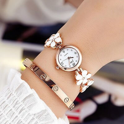 Fashion casual diamond inlaid Quartz Bracelet Watch $18.01 Dana Fashion Style: Five leaves Women's Accessories Movement type: Quartz Watch Dial size: about 2.2cm in diameter for pentaphyllum and 2.5cm for tetrafolium Dial thickness: about 0.6cm Strap mate