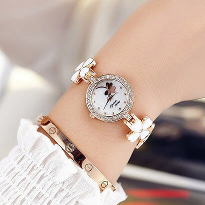 Fashion casual diamond inlaid Quartz Bracelet Watch $18.01 Dana Fashion Style: Five leaves Women's Accessories Movement type: Quartz Watch Dial size: about 2.2cm in diameter for pentaphyllum and 2.5cm for tetrafolium Dial thickness: about 0.6cm Strap mate