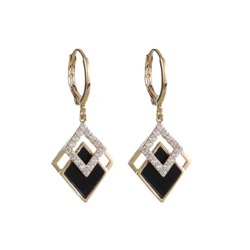Fashion Diamond Shuangling-shaped Temperament Earrings $19.90 Dana Fashion Color: Black Women's Accessories Product information: Treatment Process: Electroplating Style: Women's Color: Black Material: Alloy Shape: Diamond Packing list: Earrings *1 pair Pr