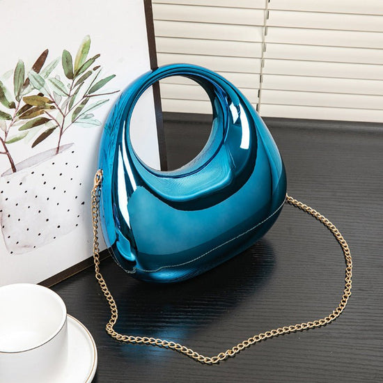 Fashion High-grade Versatile Chain Shoulder Crossbody Handbag $31.99 Dana Fashion Color: Blue Size: 22.5X7X20.5CM Women's Bags Product information: Applicable scenarios: Daily matching Color: gold, silver, red, blue, green, pink, black, colorful pink Blue