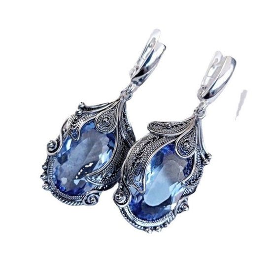 Fashion Imitation Platinum Inlaid Blue Zircon Women's Creative Drop Earrings $15.00 Dana Fashion Color: Blue Diamond White Gold Color Women's Accessories Product information: Color: Blue Diamond [white gold color]] Applicable people: women Material: Alloy