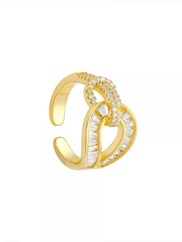 Fashion Micro-inlaid Zircon Ring Women $19.08 Dana Fashion Color: Gold Women's Accessories Product information: Type: Ring Treatment Process: Electroplating Color: Micro-inlaid split ring Style: Women's Material: Copper Style: Fashion Packing list: Ring *