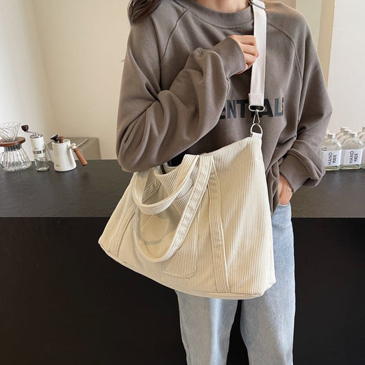 Fashion Personality Large Capacity Corduroy Bag Women $36.99 Dana Fashion Color: Beige Women's Bags Product information: Color: Milky White, pink, green, black, khaki Hardness: soft Material: corduroy Suitcase shape: Horizontal Square Style: Urban Simplic