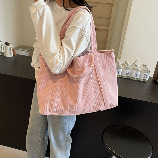 Fashion Personality Large Capacity Corduroy Bag Women $36.99 Dana Fashion Color: Beige Women's Bags Product information: Color: Milky White, pink, green, black, khaki Hardness: soft Material: corduroy Suitcase shape: Horizontal Square Style: Urban Simplic