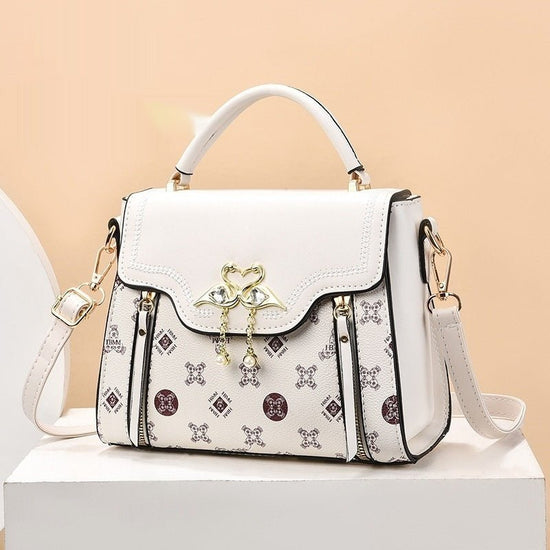 Fashion Printed Women's Portable Shoulder Small Square Bag For Women $46.67 Dana Fashion Color: Beige Women's Bags Product information: Lining texture: PU Applicable scenario: Daily configuration Color: Brown, Milky White, green, pink, brown Outer bag typ