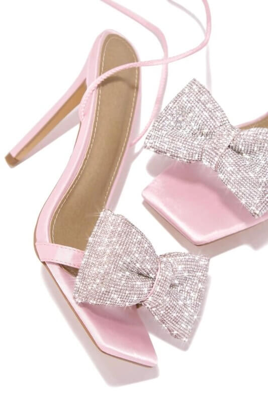 Fashion Rhinestone Bow Cross Strap Outdoor High Heel Sandals $59.90 Dana Fashion Color: Black Size: 35 Women's shoes Product information: Lining material: PU Toe holder shape: square head Color: black, pink, gold, silver Shoe Upper material: PU Size: 35,3