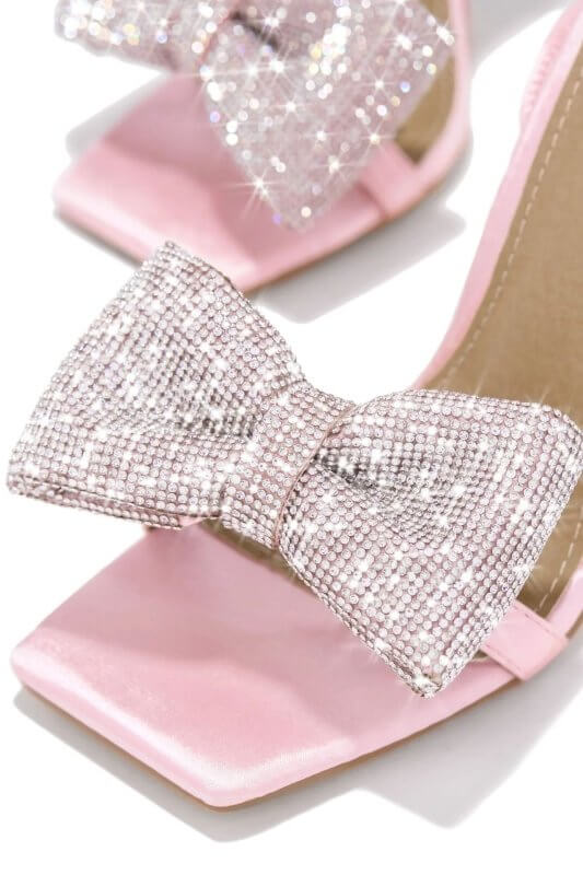 Fashion Rhinestone Bow Cross Strap Outdoor High Heel Sandals $59.90 Dana Fashion Color: Black Size: 35 Women's shoes Product information: Lining material: PU Toe holder shape: square head Color: black, pink, gold, silver Shoe Upper material: PU Size: 35,3