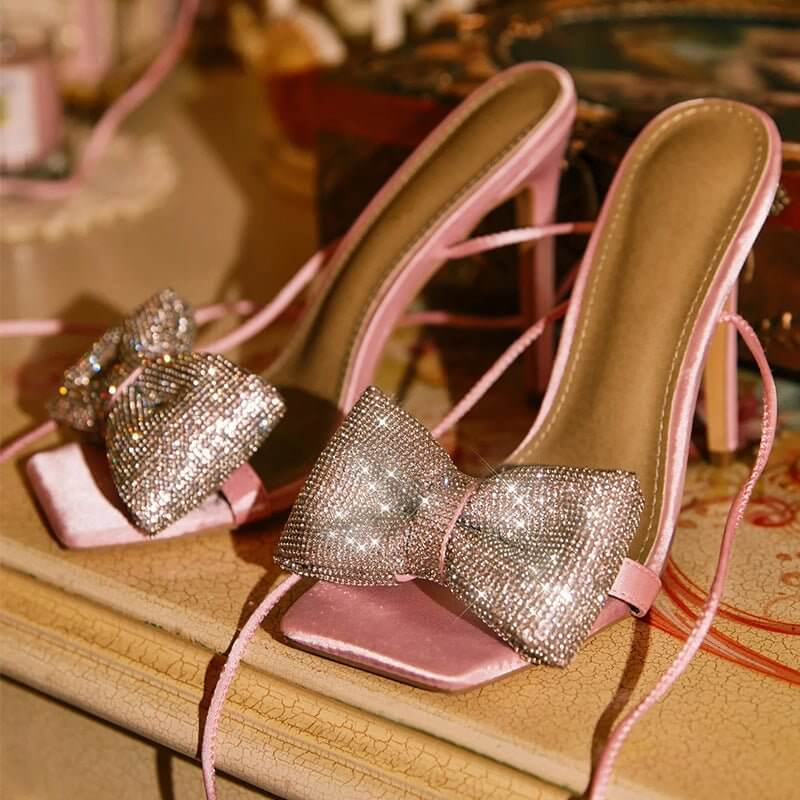 Fashion Rhinestone Bow Cross Strap Outdoor High Heel Sandals $59.90 Dana Fashion Color: Black Size: 35 Women's shoes Product information: Lining material: PU Toe holder shape: square head Color: black, pink, gold, silver Shoe Upper material: PU Size: 35,3