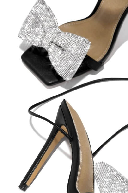 Fashion Rhinestone Bow Cross Strap Outdoor High Heel Sandals $59.90 Dana Fashion Color: Black Size: 35 Women's shoes Product information: Lining material: PU Toe holder shape: square head Color: black, pink, gold, silver Shoe Upper material: PU Size: 35,3