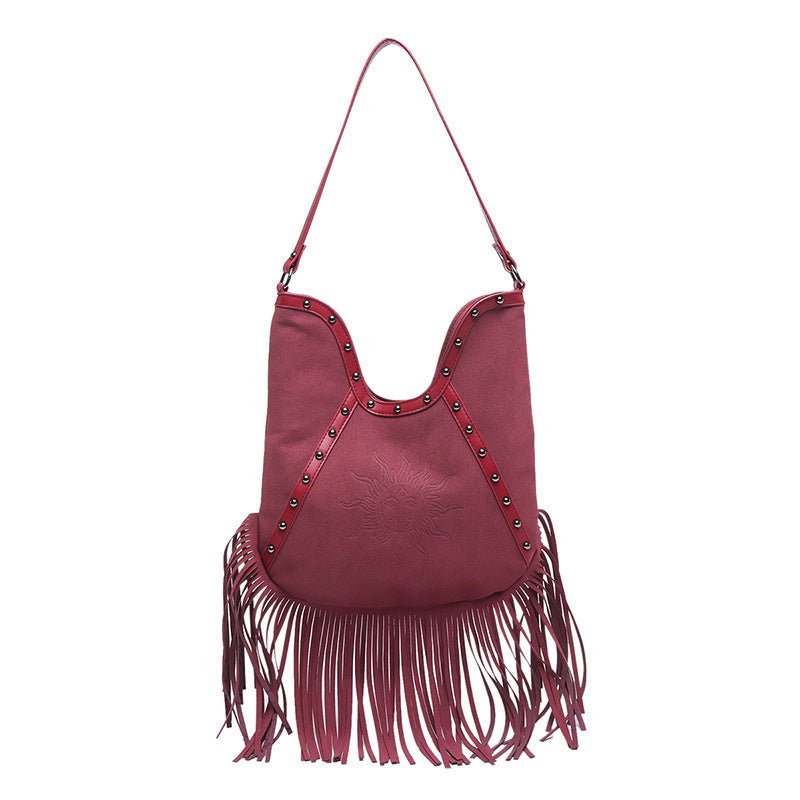 Fashion Rivet Shoulder Large-capacity Crossbody Bag $37.47 Dana Fashion Color: Black Women's Bags Product information: Color: black, green, red, brown Hardness: soft Material: PU Suitcase shape: Bucket Bag internal structure: zipper change bag Popular ele