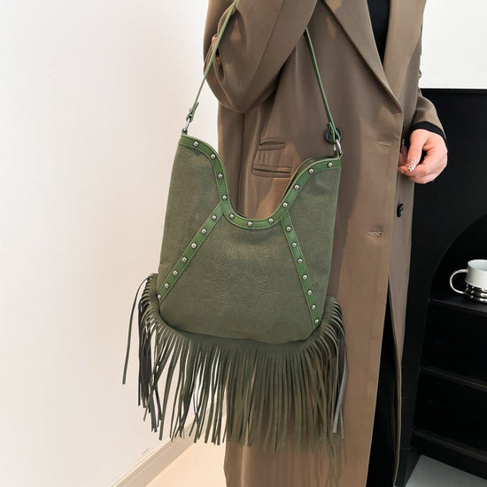Fashion Rivet Shoulder Large-capacity Crossbody Bag $37.47 Dana Fashion Color: Black Women's Bags Product information: Color: black, green, red, brown Hardness: soft Material: PU Suitcase shape: Bucket Bag internal structure: zipper change bag Popular ele